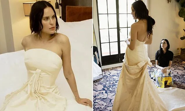 Demi Moore looks on with pride as daughter Tallulah Willis unveils her stunning Balenciaga wedding dress during final fitting at the Chateau Marmont after hand-beaded gown took 712 hours to create
