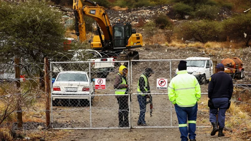 South Africa mine dump collapse kills at least 14 suspected illegal miners
