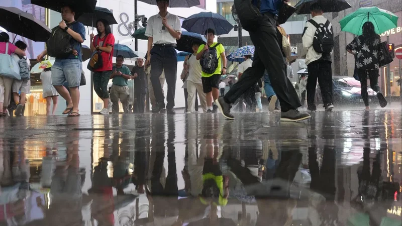Relief after 9 blistering days as Hong Kong issues amber rainstorm warning