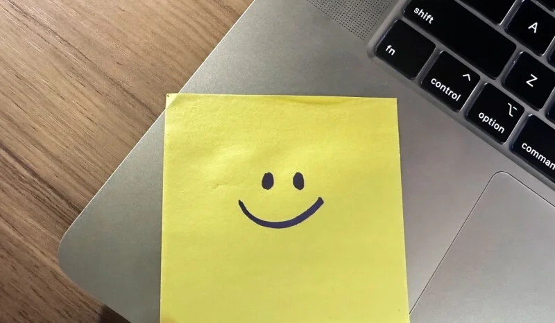 IT department put sticky notes on the laptops to help employees log in