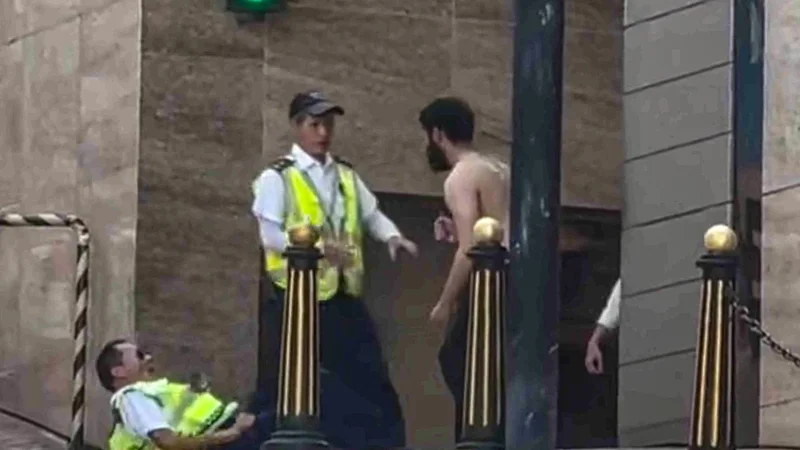 Man with knife arrested after allegedly injuring 2 at Hong Kong housing estate