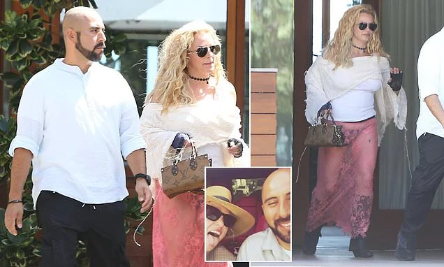 Does Britney Spears have a new boyfriend? Superstar steps out with a mystery man in Malibu while showing off her panties in sheer skirt