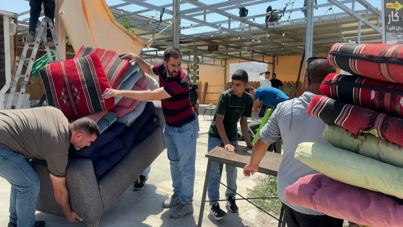 Shop owners dismantle businesses after Israeli demolition orders