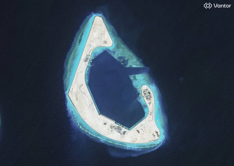 China finishes first phase of construction at South China Sea reef, images show