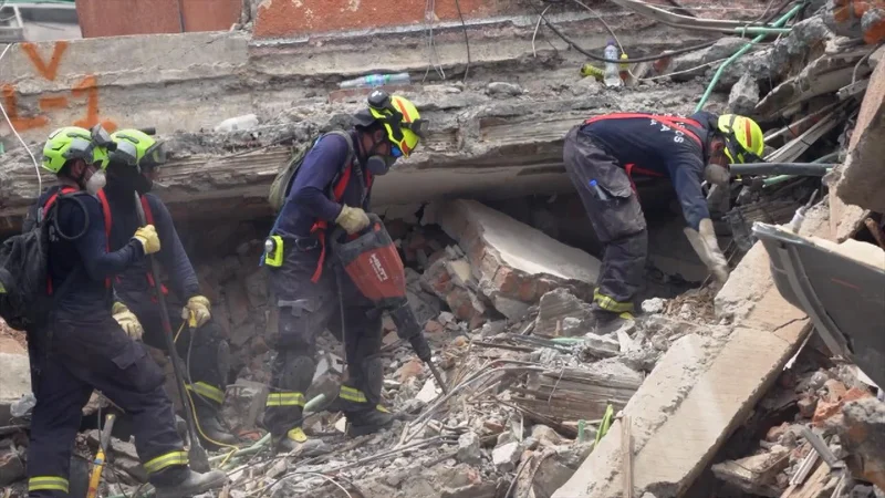 Rescue teams and volunteers race to find survivors after earthquake