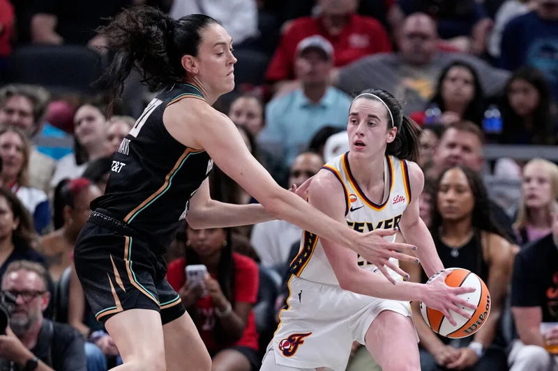 Kelsey Mitchell, Caitlin Clark help Fever continue hot streak with 106-92 victory over Liberty